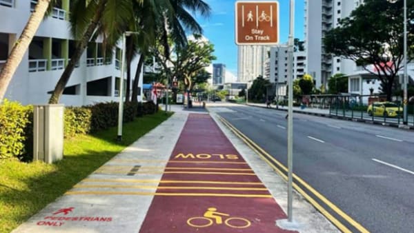 Bicycles kick scooters will be banned from footpaths adjacent to cycling lanes enforcement from July 2025 CNA